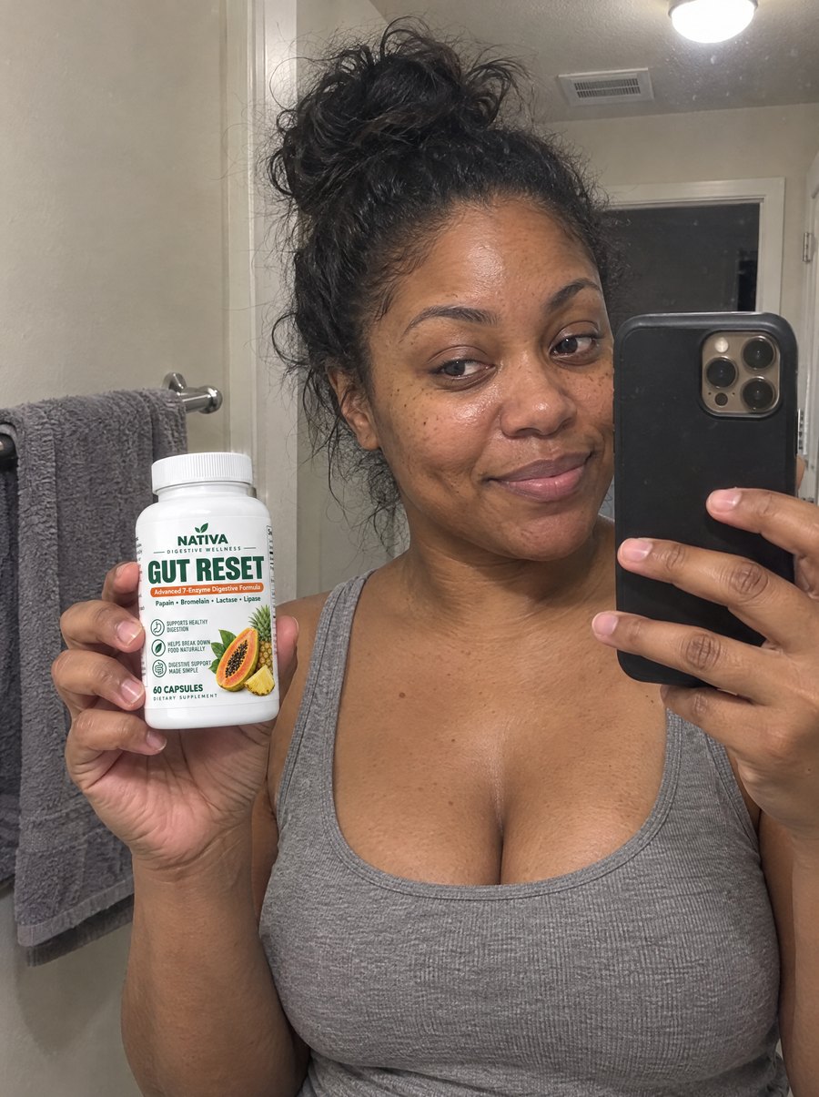 A woman taking a mirror selfie with the Nativa Gut Reset bottle